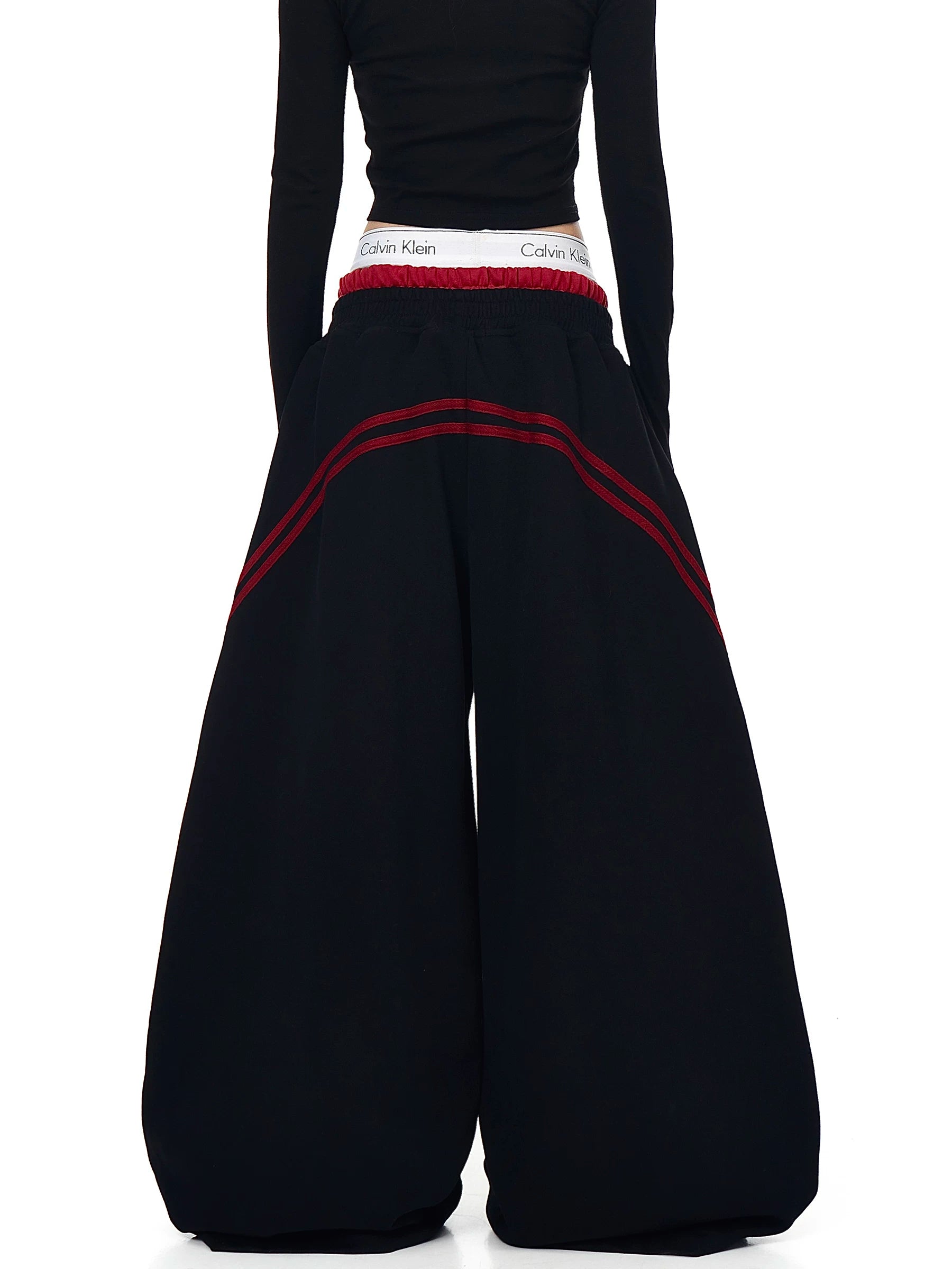 Black striped curved wide-leg sweatpants, back view - Techwearofficial