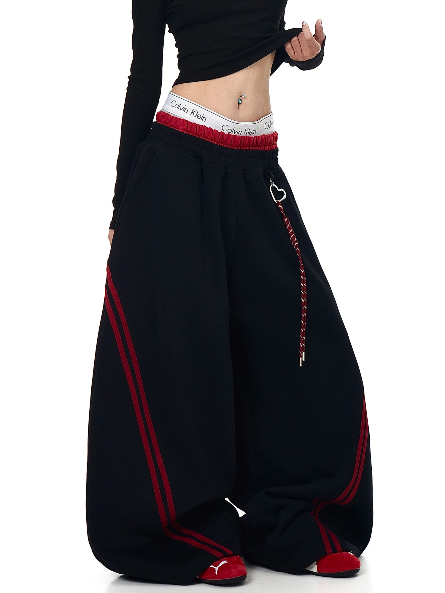 Black patchwork curved wide-leg sweatpants, side angle - Techwearofficial