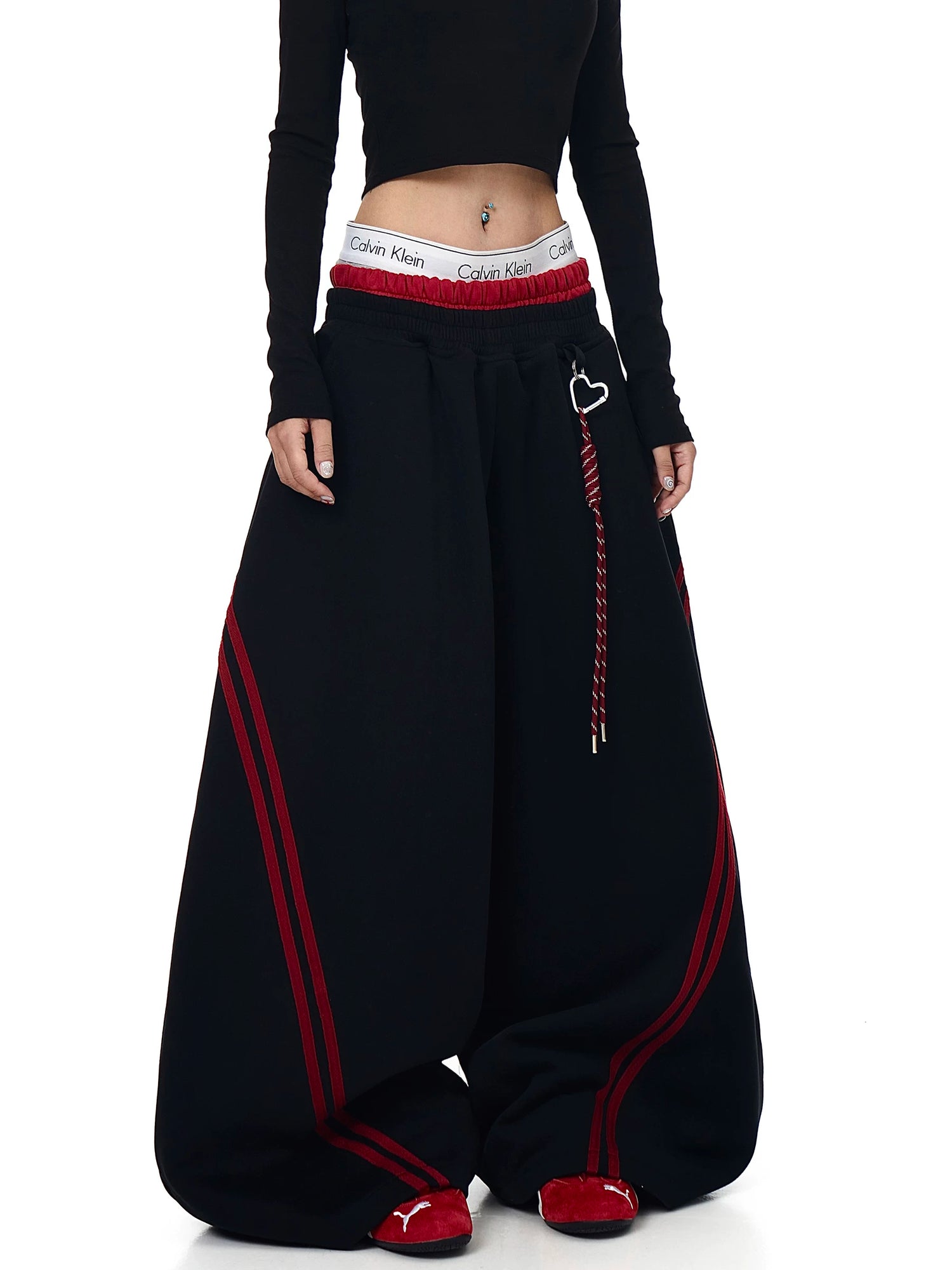 Black extra-wide sweatpants styled at a front angle - Techwearofficial