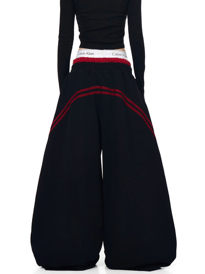 Black striped curved wide-leg sweatpants, back view - Techwearofficial