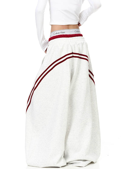 Gray striped curved wide-leg sweatpants, back view - Techwearofficial