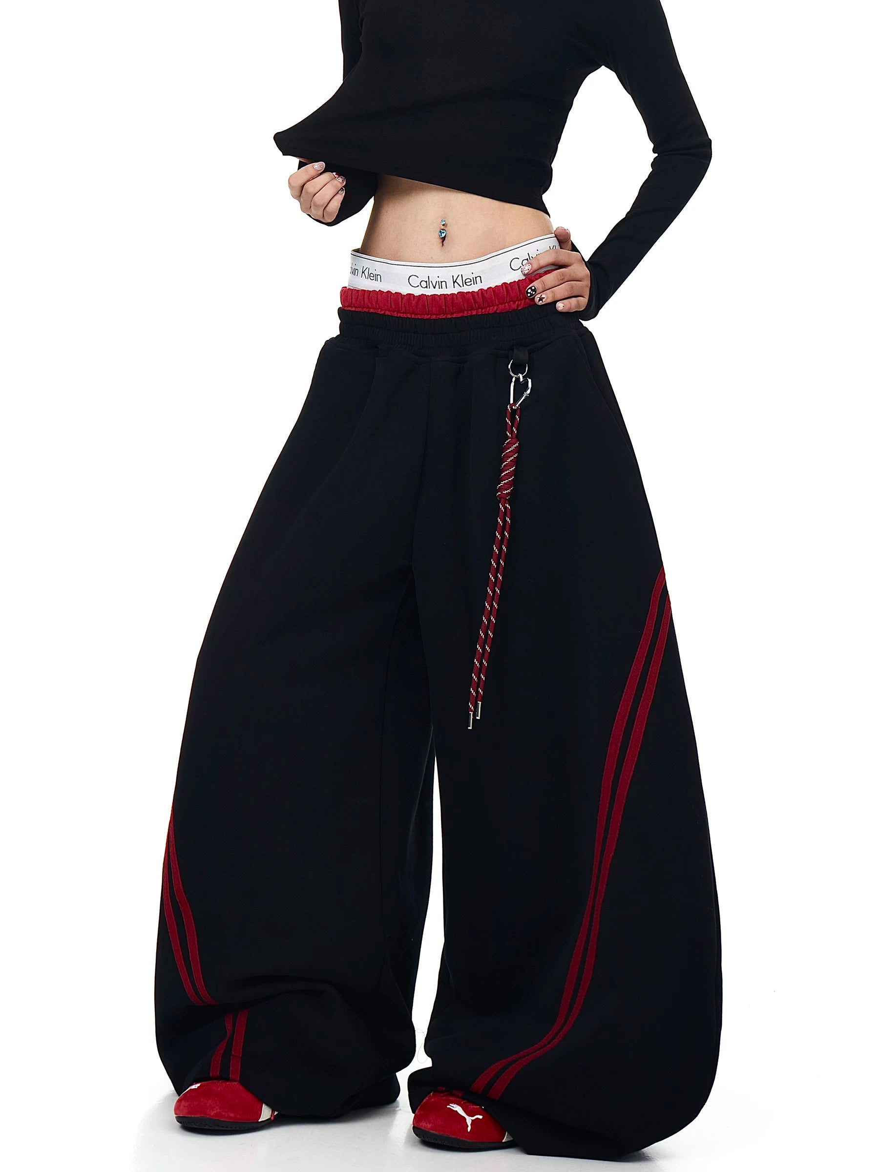 Black curved-leg sweatpants with red side stripes - Techwearofficial