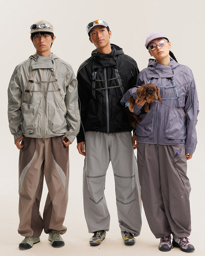 2-in-1 detachable hooded techwear jacket worn by three models in Sandstone Khaki, Midnight Black and Mist Lavender, outdoor lifestyle group